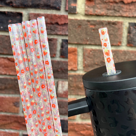 Clear strawberries with bows - 40 ounce straw